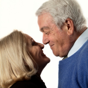 Request-an-Assessment_senior-couple_blue-sweater_white-background
